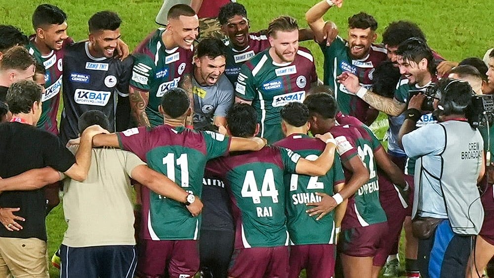 | Photo: PTI/Swapan Mahapatra : File photo of Mohun Bagan Super Giants players celebrating after winning against BSF FT in the Durand Cup 2025